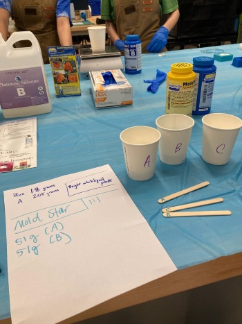 picture of cups and popsicle sticks